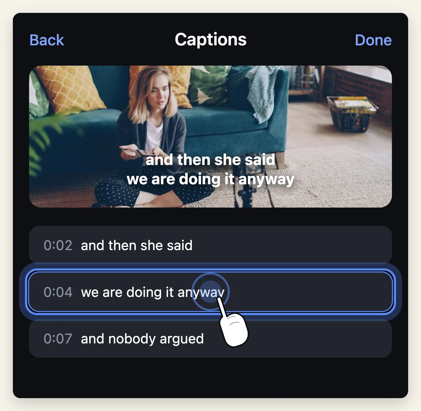A caption line being edited in the list under the preview, with the same line burnt onto the video of the person speaking above it.