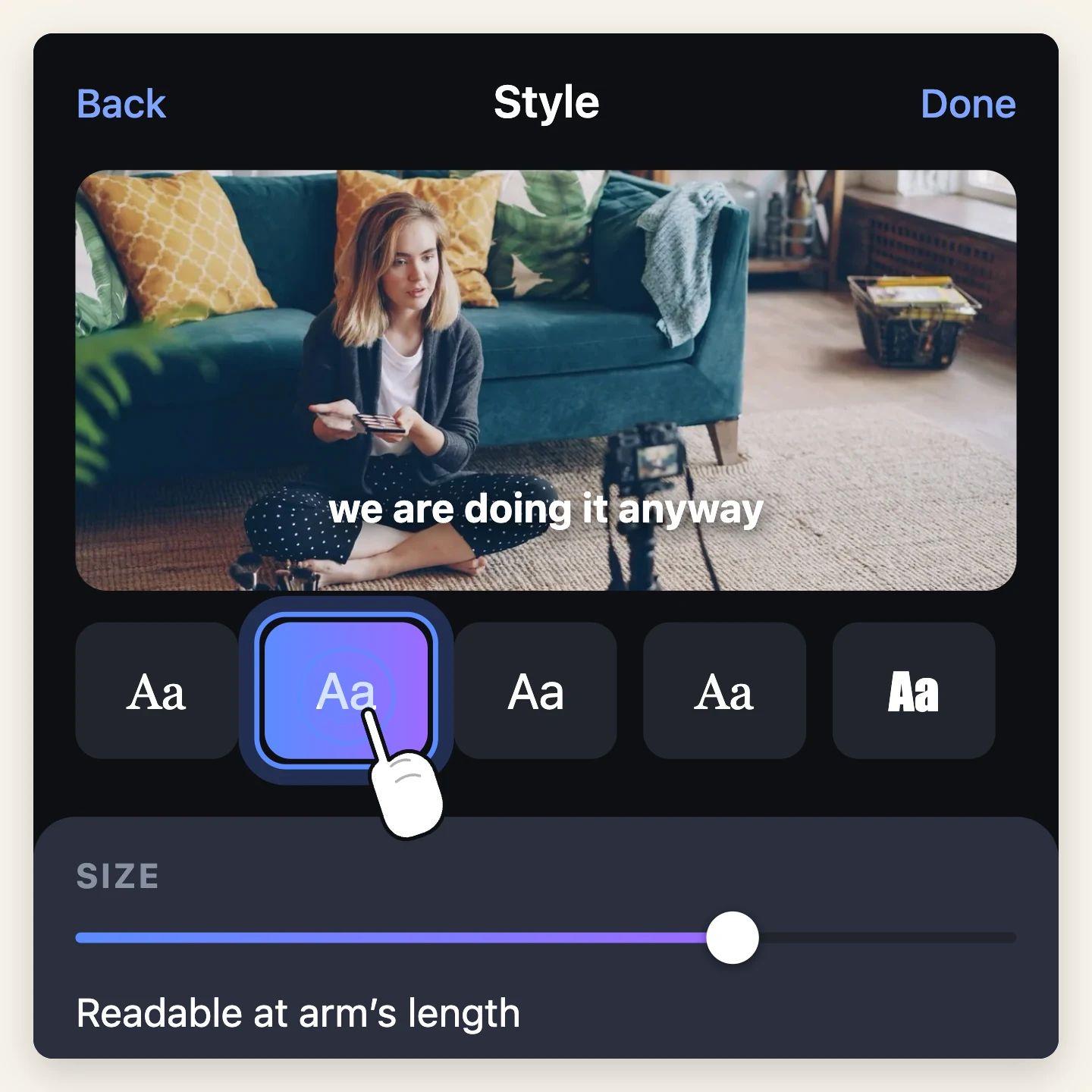 Caption styling: a type face picked from the font row and the size slider pushed high, with the caption shown over the speaker above.